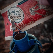 Emptying Hikers Brew Red Rocks Coffee packet into mug