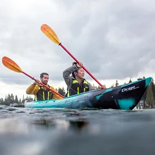 Two paddlers in the Old Town Dirigo Tandem Plus kayak