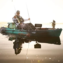 Man fishing from the Old Town Sportsman 106 MK