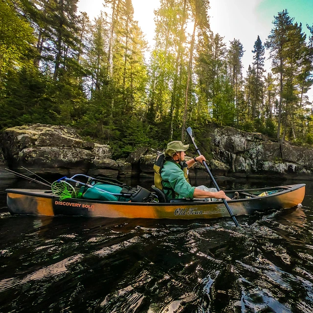 Paddling in the Old Town Sportsman Discovery Solo 119 canoe