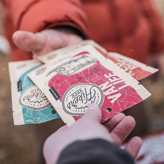 Passing several varieties of Hikers Brew Trail Coffee packets