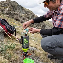 Man making Mile Marker coffee on the trail