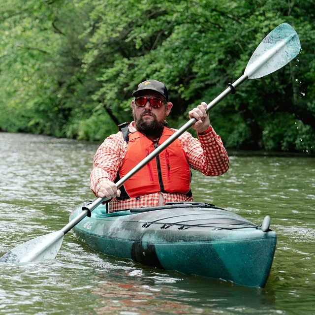 Wearing the Old Town Riverstream Universal Life Jacket in Orange