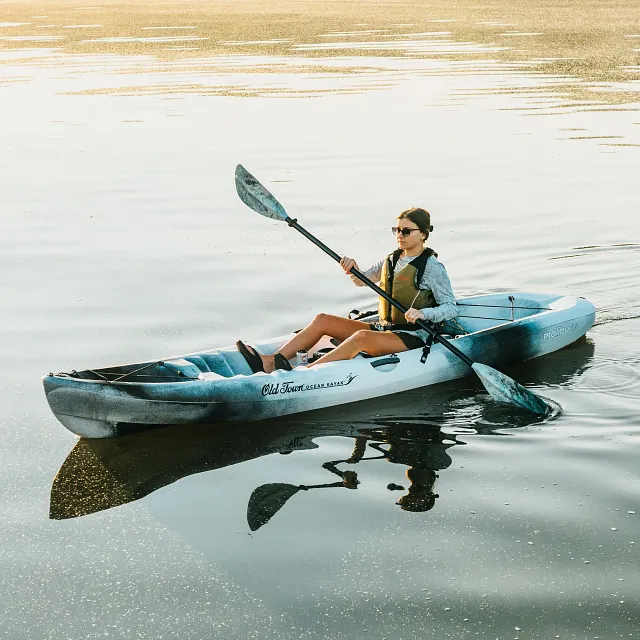 Woman paddling in the Old Town Ocean Kayak 11.5 kayak