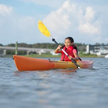 Child paddling in Ocean Kayak Banzai Kayak