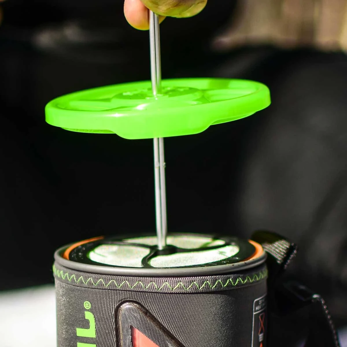 Silicone coffee press being used in a Flash cook pot