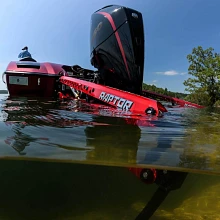 Red Raptors deployed on boat with spikes shown anchoring under water