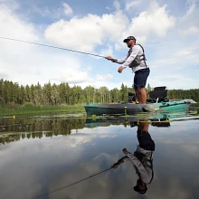 Standing up and fishing in the Sportsman PDL 106 fishing kayak