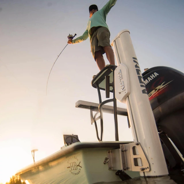 White Talon mounted on transom with angler on table