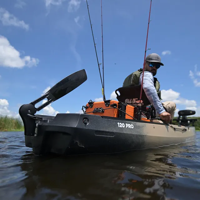 120 PRO rudder kit installed on 120 Pro kayak deploying into water