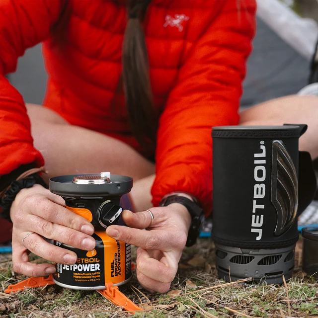 Turning the heat control on the Jetboil Flash 1.0L Cooking System