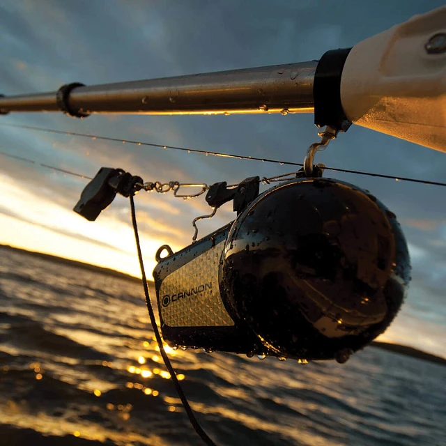 Closeup of downrigger weight on boom hook