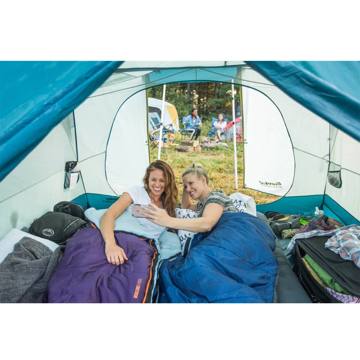 Two women taking a selfie in a Space Camp  tent