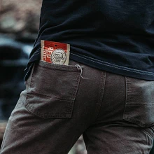 Red Rocks Mile Marker Coffee packet in back pocket of jeans