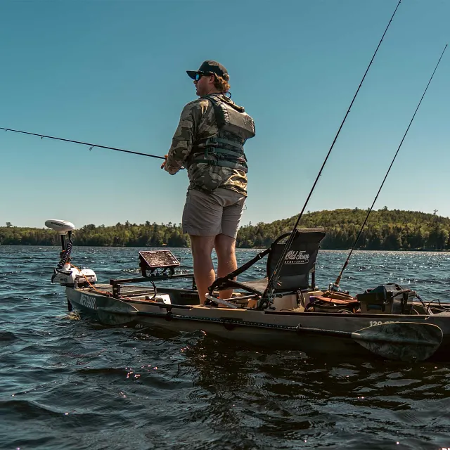 Standing up fishing from the Old Town Sportsman 120 Pro fishing kayak