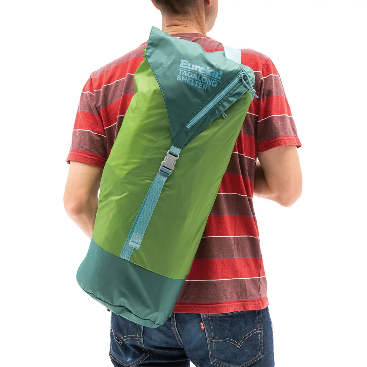 Man carrying Eureka! Tagalong Shelter packed in Carry Bag