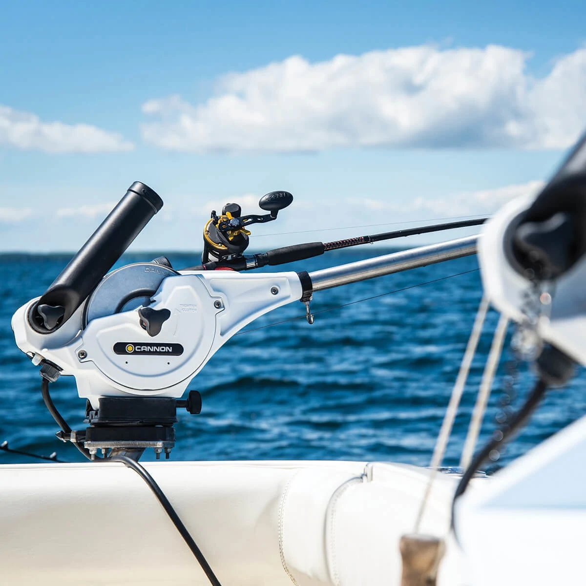 Black composite rod holder that mounted directly to downrigger 