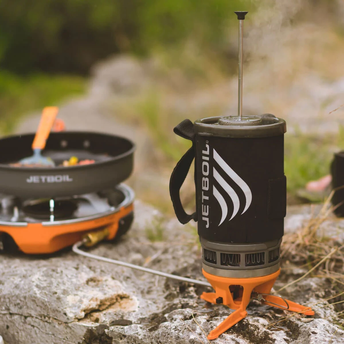 Cooking with Luna Satellite Burner linked to a Genesis stove