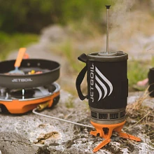 Cooking with Luna Satellite Burner linked to a Genesis stove