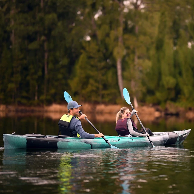 Two paddlers in the Old Town Dirigo Tandem Plus kayak